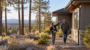 Homebuyer examining the roofline and defensible space around a Bend home surrounded by ponderosa pines